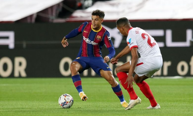 Coutinho y Fernando, en un Barcelona-Sevilla. / Foto: FCB